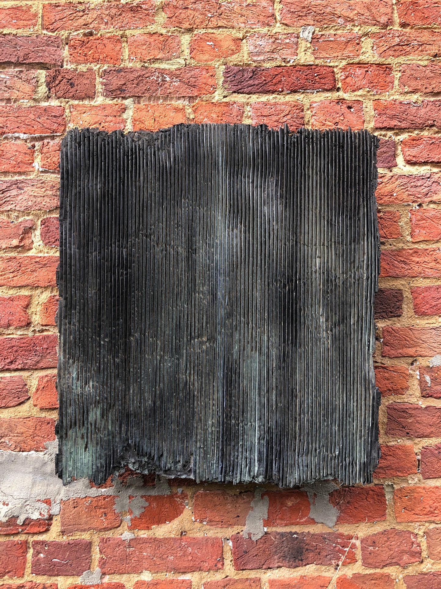 Pleated plaque